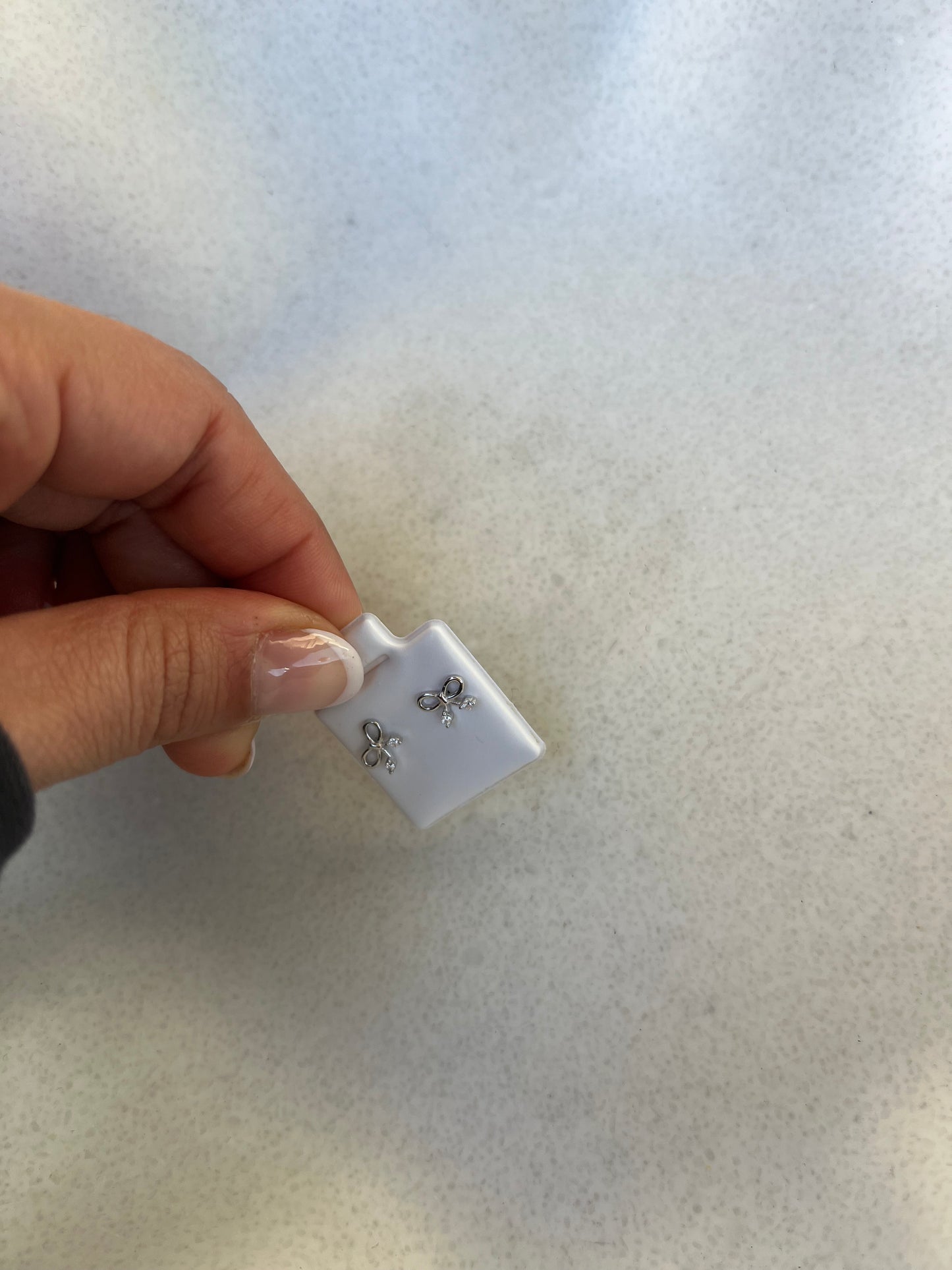 Bow w stones - stud earrings